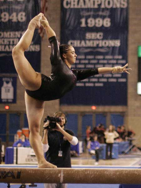 Wildcat gymnast on the balance beam