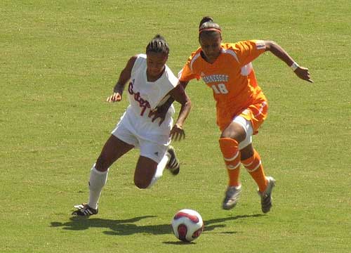 Florida's Ameera Abdullah battles Tennessee's Erica Griffin for control of the soccer ball