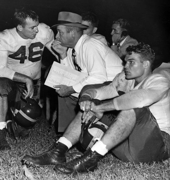 Chuck Hunsinger (#46) with Florida Coach Raymond 