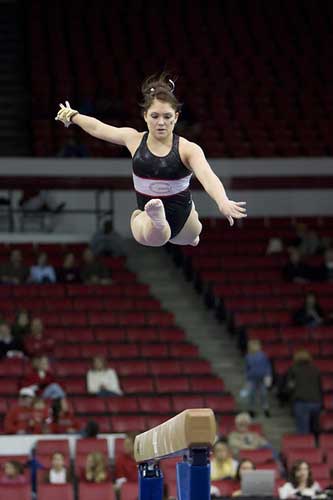  Bulldog gymnast Courtney McCool fly's through the air 