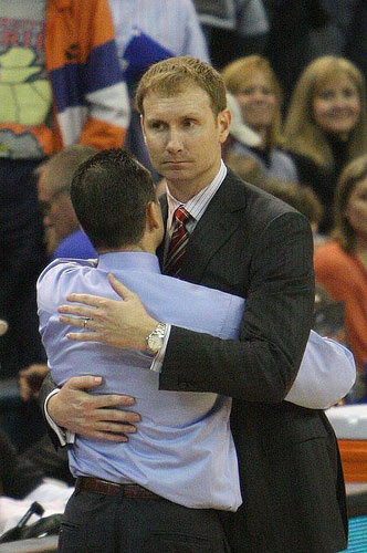 Arkansas basketball coach john pelphrey hugs florida coach billy donovan