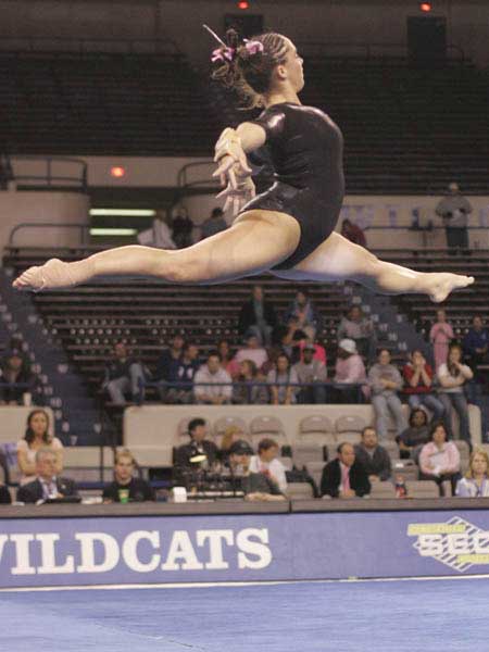  kentucky wildcat gymnast soars through air 