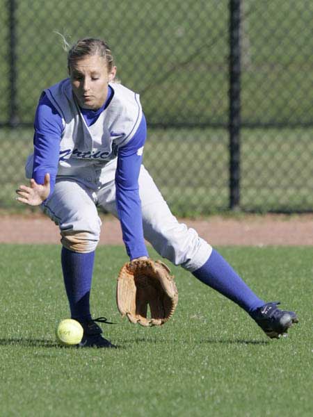 Kentucky softball player fields the ball