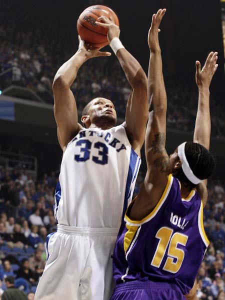 LSU basketball player plays defense 