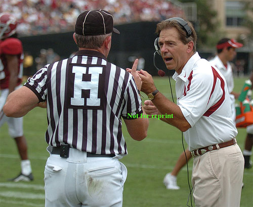  Nick Saban argues with referee.