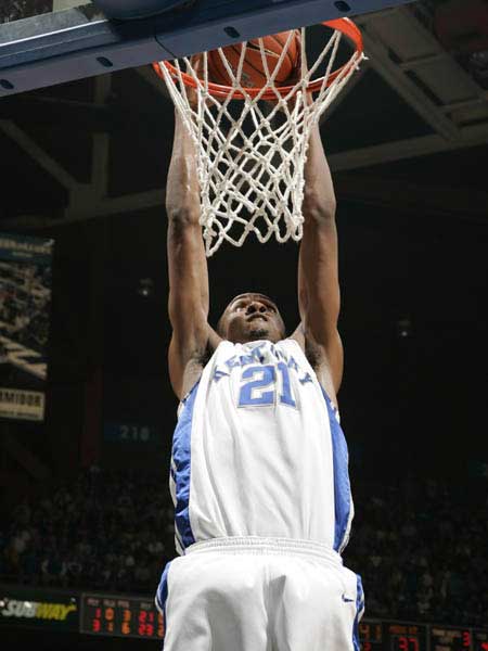  UK's Perry Stevenson jams a dunk 