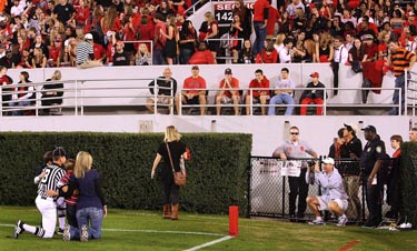 Referee Poses With Fans Before Georgia - Auburn Game 