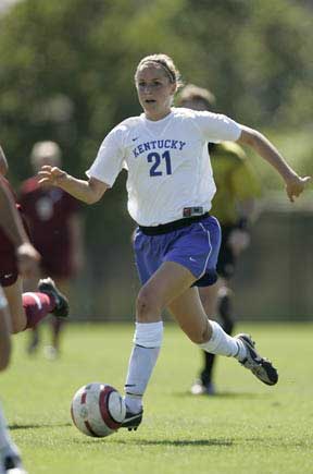  UK player dribbles soccer ball 