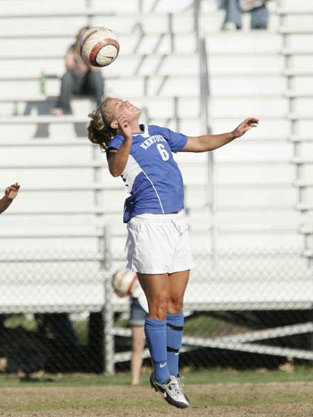  UK soccer player heads the ball 