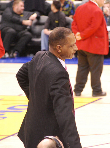 Trent johnson walks to scorers table