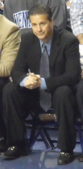 John Calipari coaching a game for the Kentucky Wildcats.